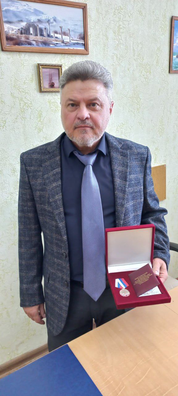 Андрей Владимирович Милакин с медалью